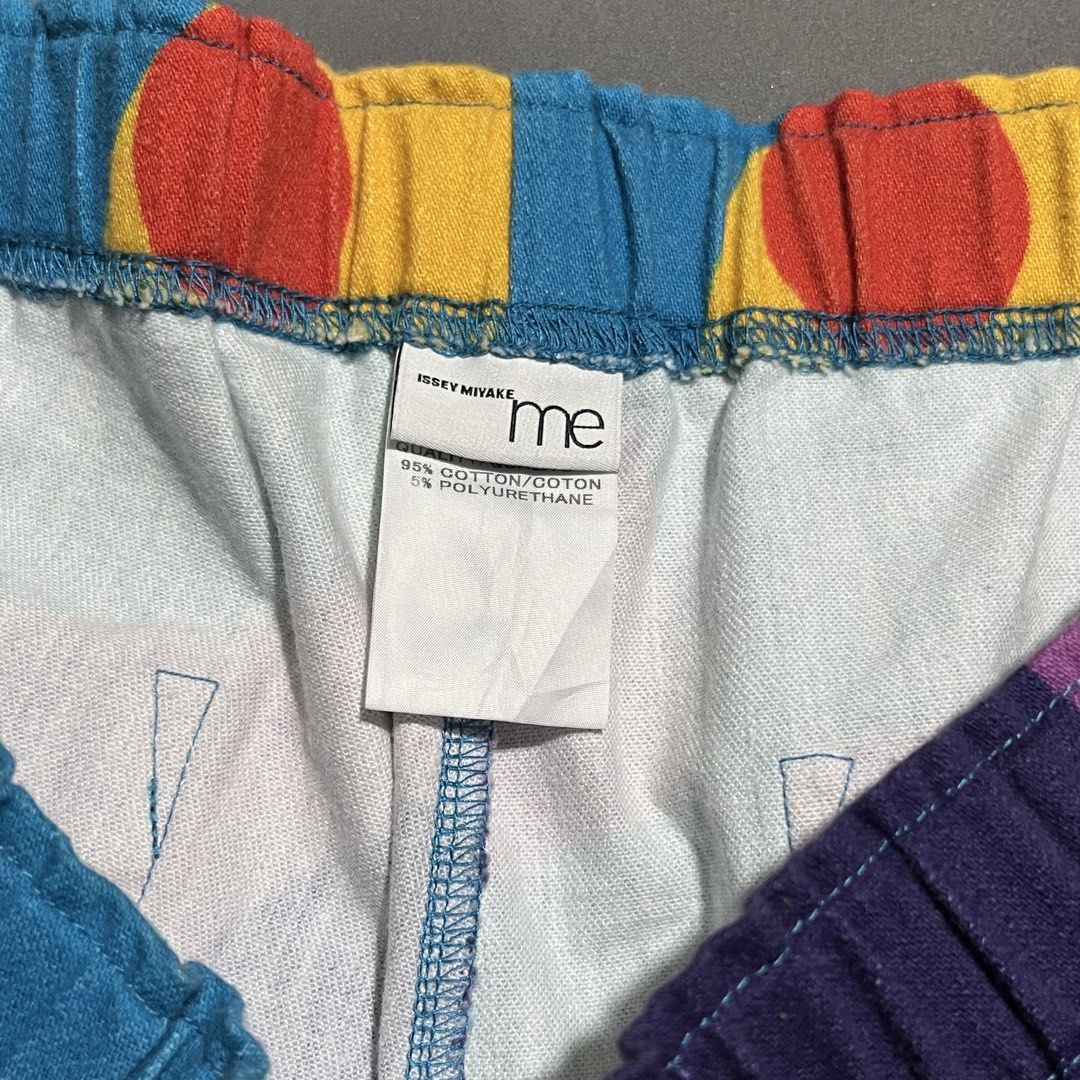 Issey Miyake Me - Printed Trouser Pants (Category: Jeans) located in Bacolod City. Submitted by rndm.wears (Listing ID 1470527027, Image 2). Description: Issey Miyake Me Crazy Graphic Pants Waist: 28-30 Length: 34 Like new condition Psychedelic Graphic Designs.