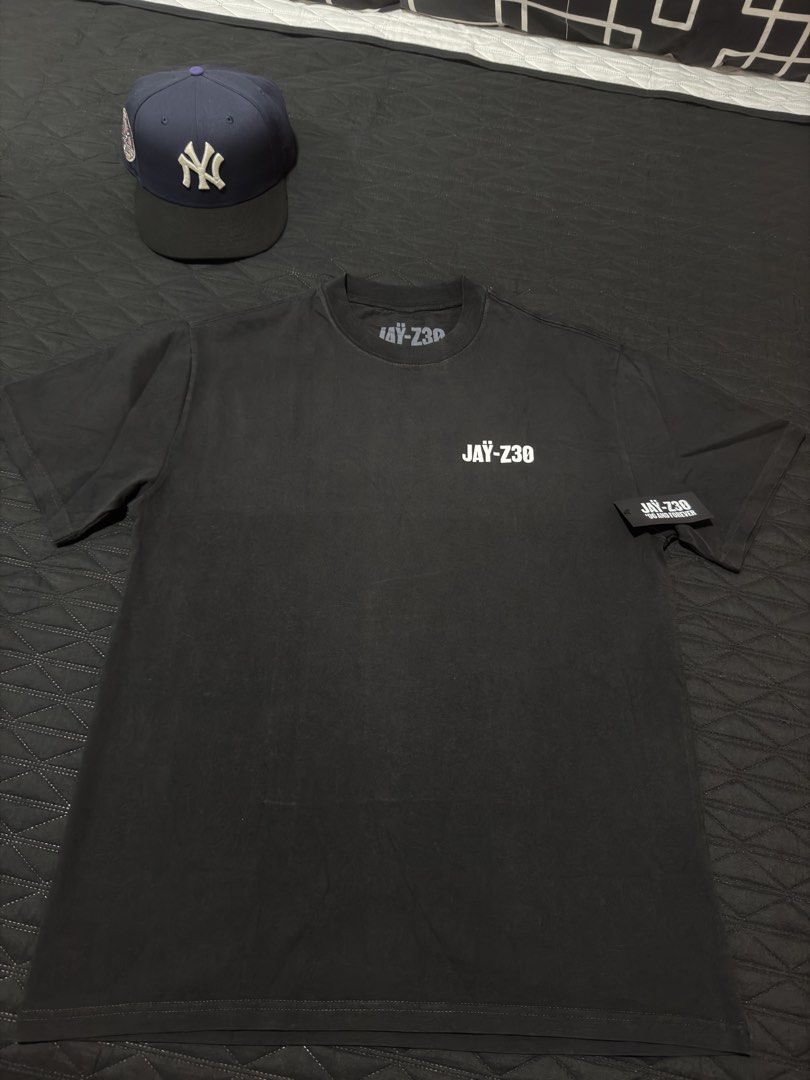 JAY-Z30 MERCH (Category: Tshirts & Polo Shirts ) located in Paranaque City. Submitted by yjjjy (Listing ID 1470438313, Image 1). Description: JAY Z30 MERCH FROM ROCNATION What’s in The Name Tees Screen printed logo on front and oversized graphic on back. Size: MEDIUM W-21 L - 28 half ₱5995 only 📍 PARAÑAQUE .