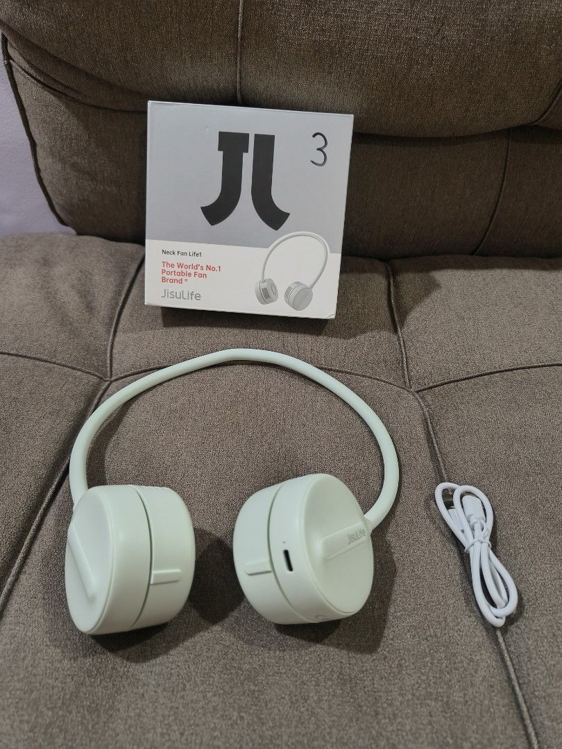 Jisulife Neck Fan Life 1 (Category: Fans) located in Manila. Submitted by cleverdog_a9b18a (Listing ID 1470350079, Image 1). Description: - Model: Jisulife Neck Fan Life 1 - Color: Soft Green - Charging: USB-C cable (included) - Condition: Complete with original box - Lightweight and portable for everyday use.