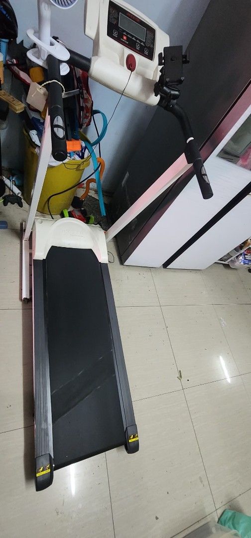JKExer 465 Motorized Treadmill (Category: Cardio & Fitness Machines) located in Manila. Submitted by wildeagle.572728 (Listing ID 1470415330, Image 2). Description: - Brand/Model: JKExer 465 Motorized Treadmill - Condition: Strong motor, well-maintained - Features: Foldable space-saving frame, digital console with clear screen, safety key - Origin: Made in Taiwan - Color: White and black - Note: Heavy equipment, self-pickup required.