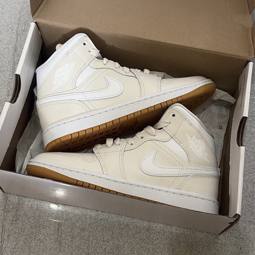 Jordan 1 Mid Phantom Gum (Category: Sneakers) located in Manila. Submitted by topdawgwardrobe (Listing ID 1470429276, Image 1). Description: Jordan 1 Mid Phantom Gum Complete OG Box With paperbag Brandnew 6 womens ₱3000 Issue: Display pair (left shoe).