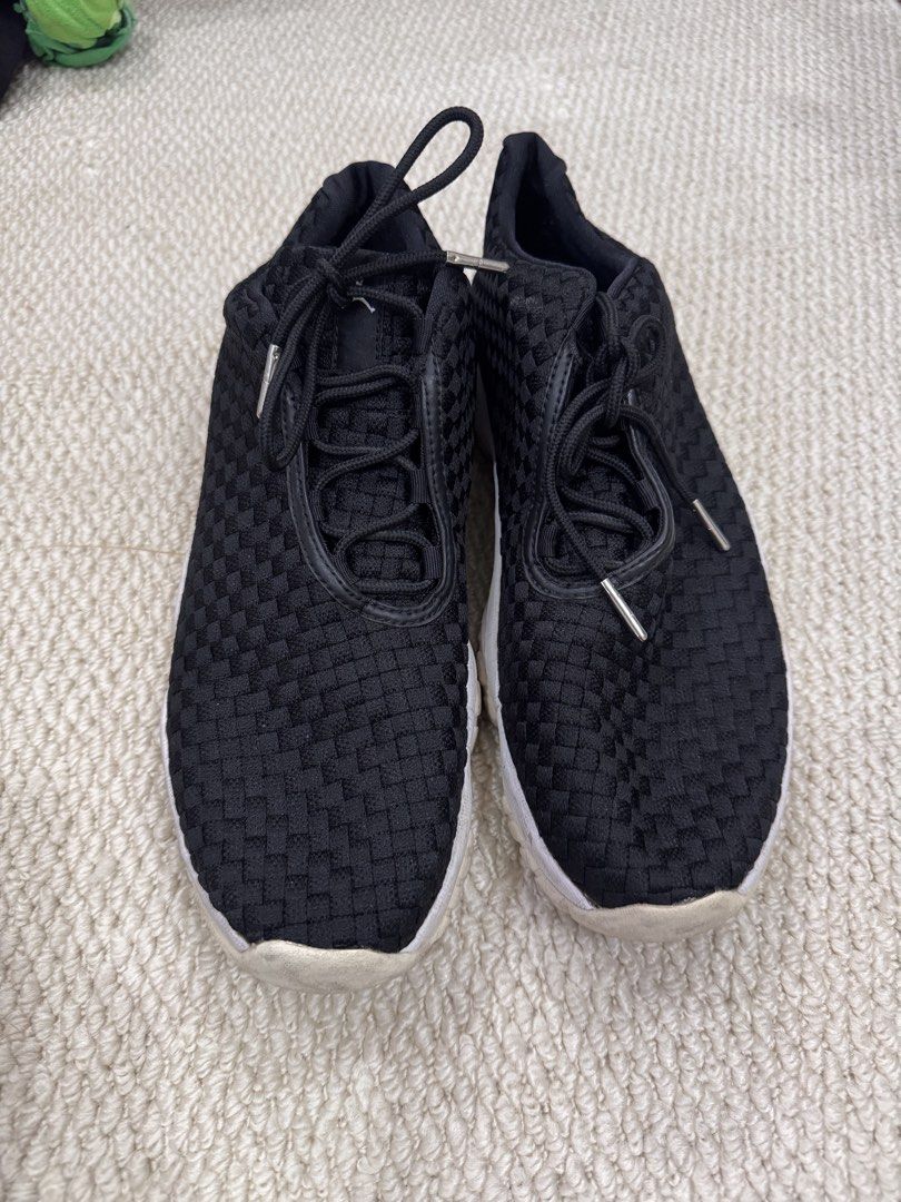 Jordan Future Black Woven Sneakers (Category: Sneakers) located in Valenzuela. Submitted by crabncorn (Listing ID 1470363020, Image 1). Description: - Style: Casual everyday kicks - Upper: Black woven material with round laces and metallic tips - Sole: White midsole with wavy traction pattern and minor wear from normal use - Branding: Jumpman logo on the tongue and insoles - Condition: Pre-loved, clean look.
