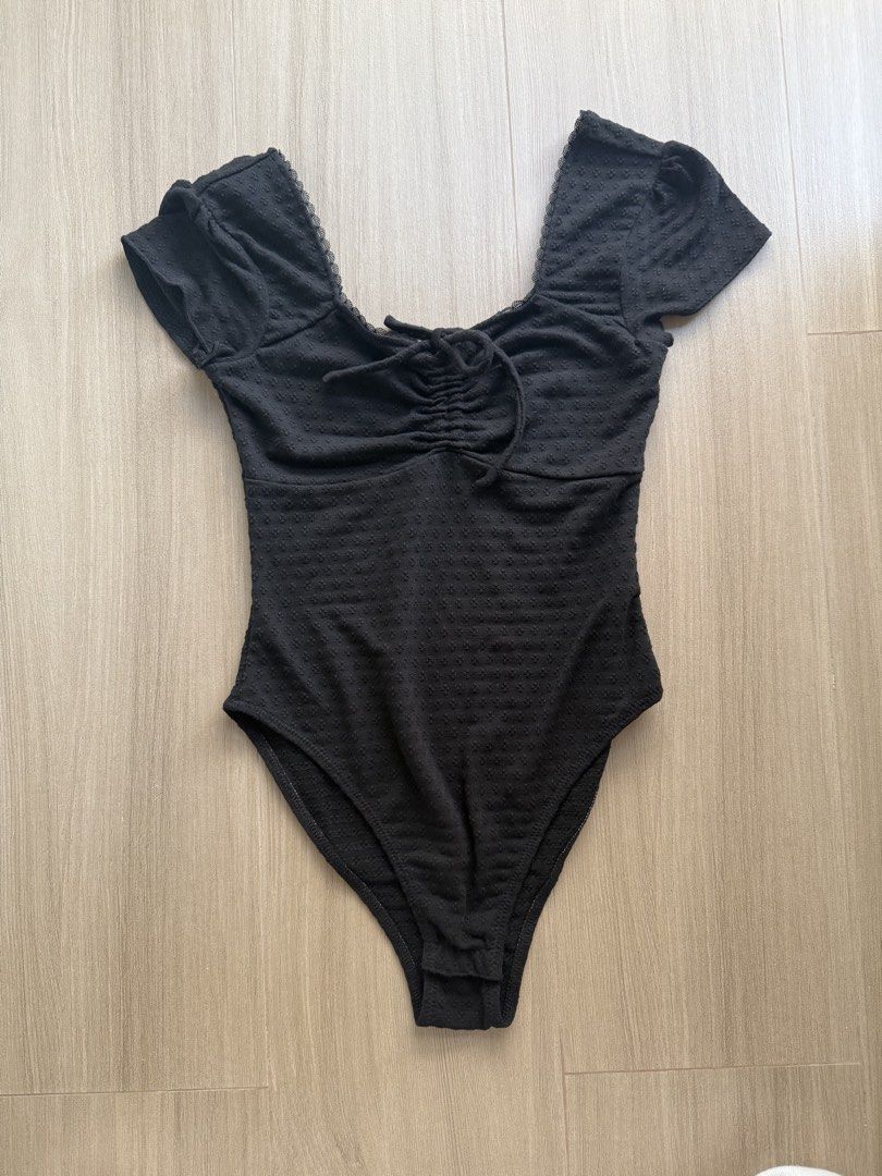 JUSTG black bodysuit with bow (Category: Sleeveless) located in Manila. Submitted by bella_boo (Listing ID 1470437002, Image 1). Description: have to sell by TUESDAY tags 🏷️ brandy melville subdued cotton on bershka stradivarius zara pull n bear hnm edikted.