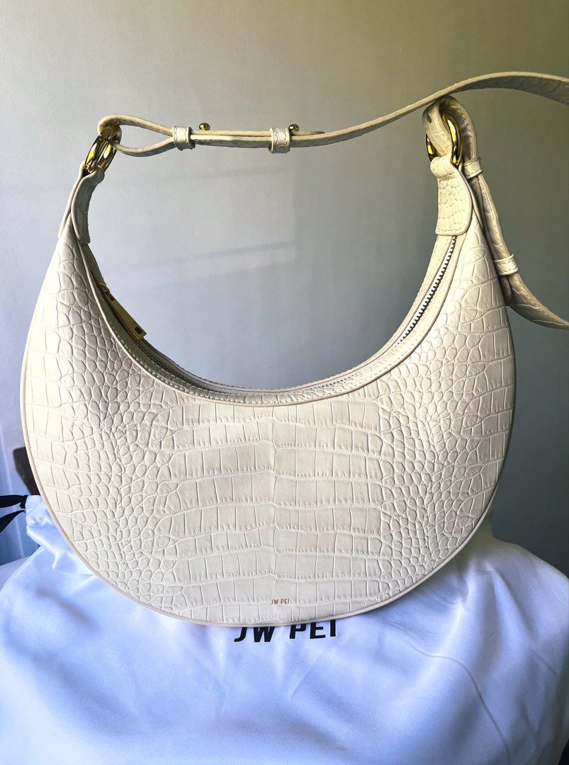 JW Pei Carly Saddle Bag Ivory Croc (Category: Shoulder Bags) located in Las Pinas. Submitted by mgmvillaluz (Listing ID 1470404201, Image 1). Description: Preloved mint condition (9/10) Carly Saddle Ivory Croc. .