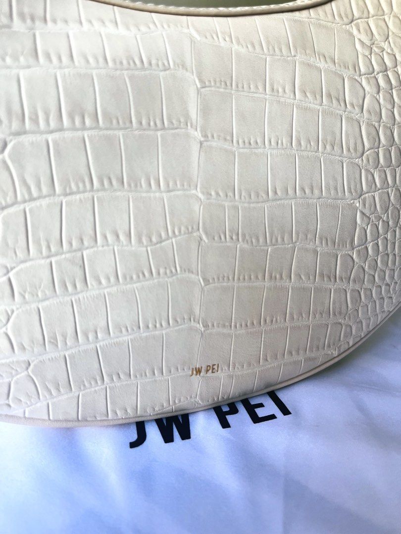 JW Pei Carly Saddle Bag Ivory Croc (Category: Shoulder Bags) located in Las Pinas. Submitted by mgmvillaluz (Listing ID 1470404201, Image 3). Description: Preloved mint condition (9/10) Carly Saddle Ivory Croc. .