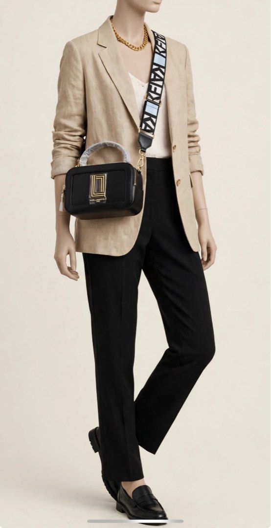 Karl Lagerfeld Paris Simone Camera Bag (Category: Cross-body Bags) located in Manila. Submitted by trustedceller (Listing ID 1470522485, Image 3). Description: Elegantly accented with gold-tone hardware and logo plaque, this crossbody by KARL LAGERFELD PARIS is crafted in leather with a double zip closure. Switch up your style and carry it by the handle or attach the webbing strap to go handsfree. Features -Small sized bag; 8”W x 5”H x 3-1/2”D (w