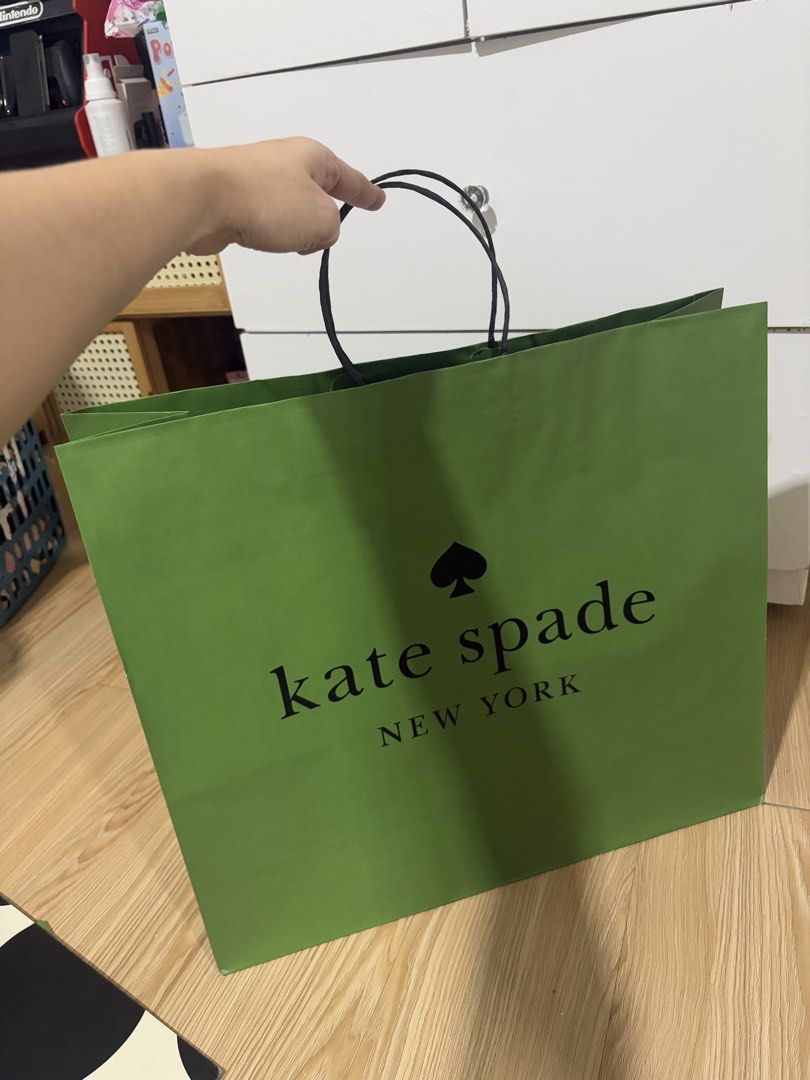 kate spade large paper bags (Category: Art & Prints) located in Cavite. Submitted by mylittlechicshop (Listing ID 1470514900, Image 1). Description: 16" height X 18" length if medium - large yung bags niyo go for large size 💯 guaranteed original from 🇨🇦 mga binibili ko lang din extra sa shoppers ko everytime may own box ako or sea cargo pasabay na items.