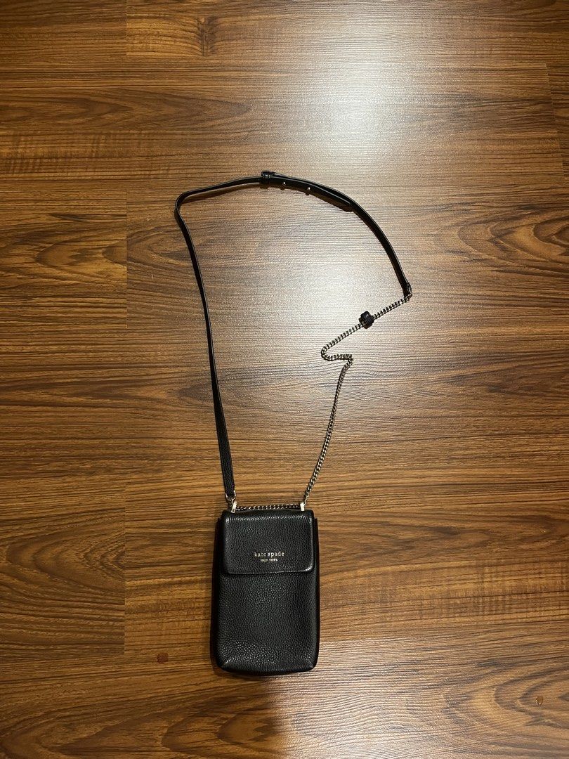 kate spade phone crossbody bag (Category: Cross-body Bags) located in Quezon City. Submitted by ichigohuh (Listing ID 1470458264, Image 2). Description: - only used once - premium black pebbled leather - fits phone, cards, and small daily essentials - negotiable.