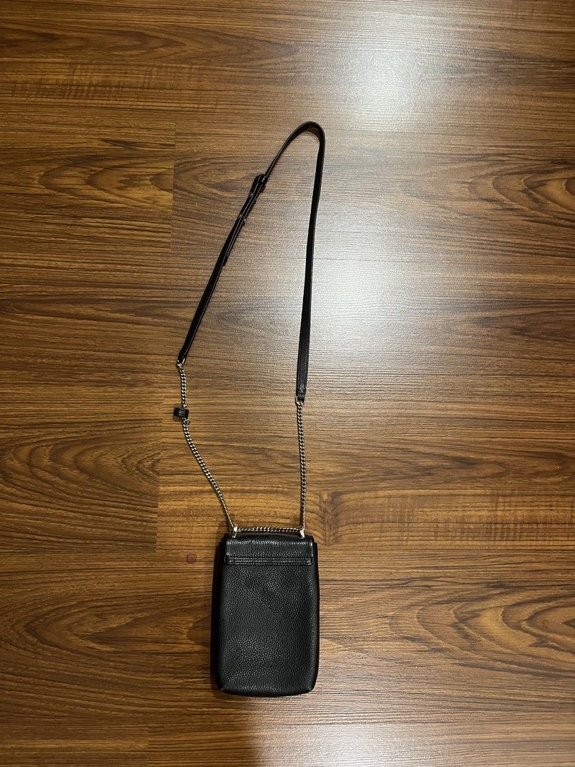 kate spade phone crossbody bag (Category: Cross-body Bags) located in Quezon City. Submitted by ichigohuh (Listing ID 1470458264, Image 3). Description: - only used once - premium black pebbled leather - fits phone, cards, and small daily essentials - negotiable.