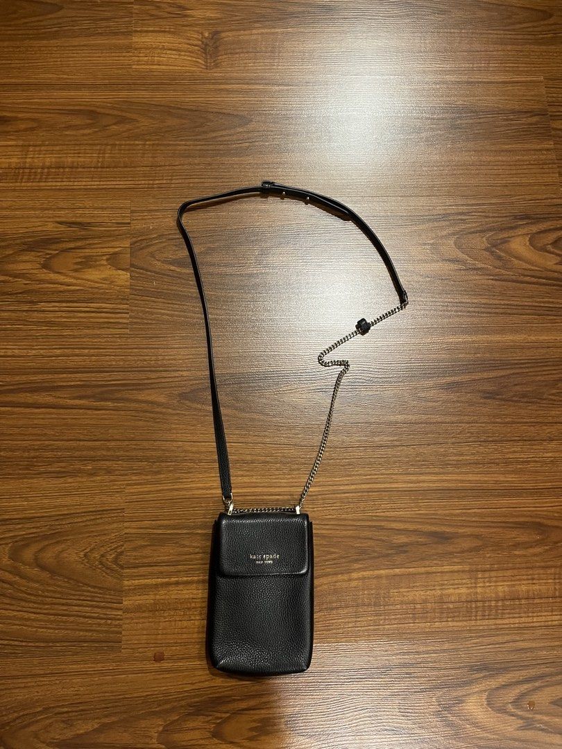 kate spade phone crossbody bag (Category: Cross-body Bags) located in Quezon City. Submitted by ichigohuh (Listing ID 1470458264, Image 1). Description: - only used once - premium black pebbled leather - fits phone, cards, and small daily essentials - negotiable.