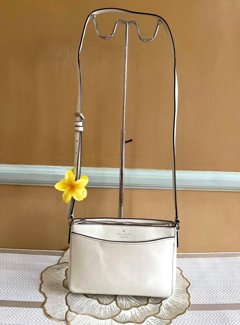 Kate Spade Sling or Crossbody Bag (Category: Cross-body Bags) located in Quezon City. Submitted by bellafashion08 (Listing ID 1470360672, Image 1). Description: Dimension: - Height = 6.5 in. - Length = 8 in. * From U.S * Nice in actual .