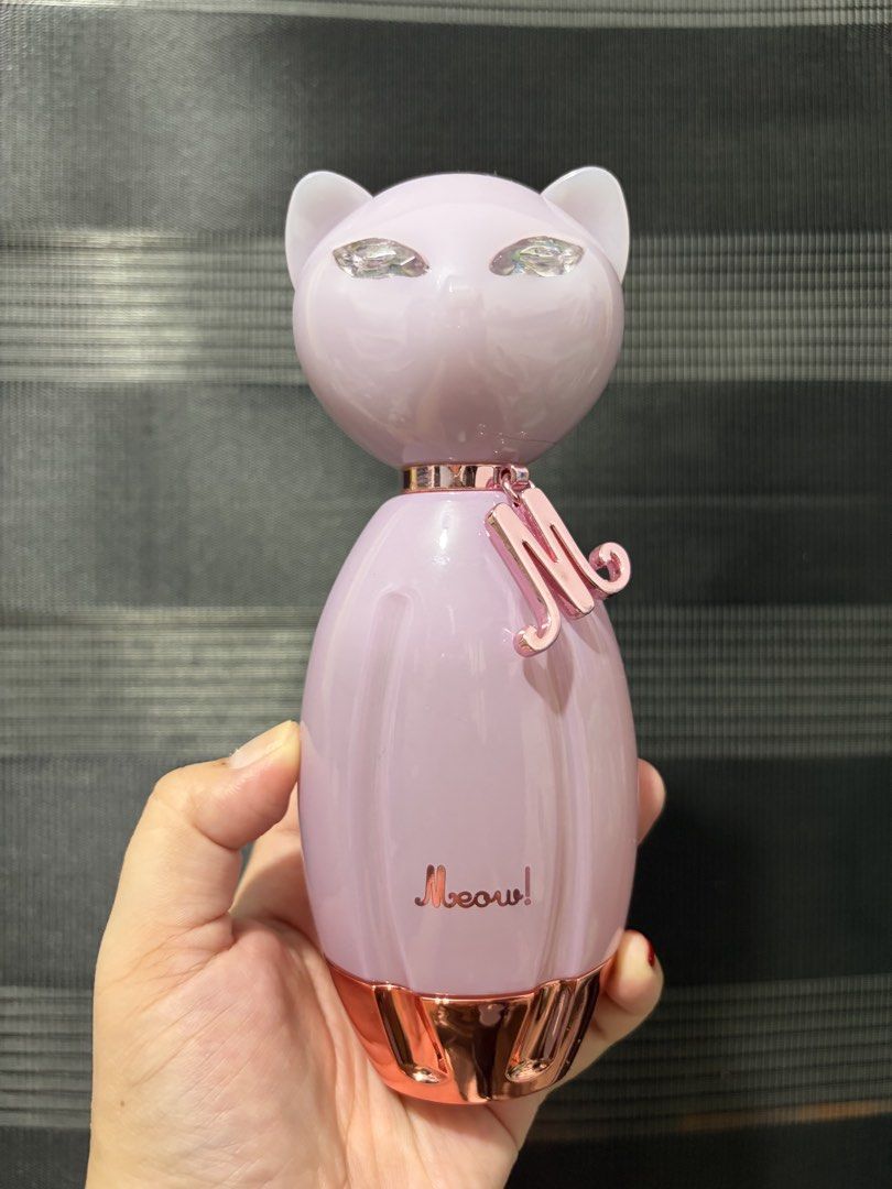 Katy Perry Meow and Purr Eau de Parfum Bundle (Category: Fragrance & Deodorants) located in Mandaluyong City. Submitted by stuffandshop2017 (Listing ID 1470524315, Image 1). Description: Katy Perry cat perfume bottle set featuring the 100ml pink Meow and purple Purr with charm. Both full-sized glass bottles are great for your vanity. Authentic and well-kept. ❗️Original po, ako po mismo bumili sa NZ Chemist warehouse Rfs: decluttering po 🥰 1k eac