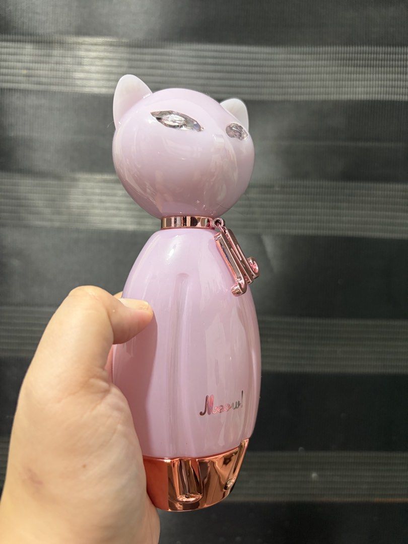 Katy Perry Meow and Purr Eau de Parfum Bundle (Category: Fragrance & Deodorants) located in Mandaluyong City. Submitted by stuffandshop2017 (Listing ID 1470524315, Image 2). Description: Katy Perry cat perfume bottle set featuring the 100ml pink Meow and purple Purr with charm. Both full-sized glass bottles are great for your vanity. Authentic and well-kept. ❗️Original po, ako po mismo bumili sa NZ Chemist warehouse Rfs: decluttering po 🥰 1k eac