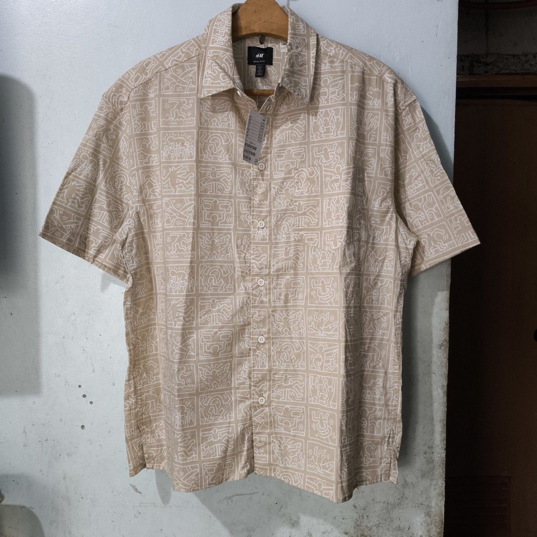 Keith Haring x H&M Short Sleeve Button Down (Category: Tshirts & Polo Shirts ) located in Quezon City. Submitted by jedclo (Listing ID 1470483053, Image 2). Description: Size S Width: 22 Length: 28 In pristine condition Color due lightning MOP: GCASH, DM to purchase Disclaimer: "All brand names, logos, and images are registered trademarks of their respective owners. No affiliation or copyright infringement intended.