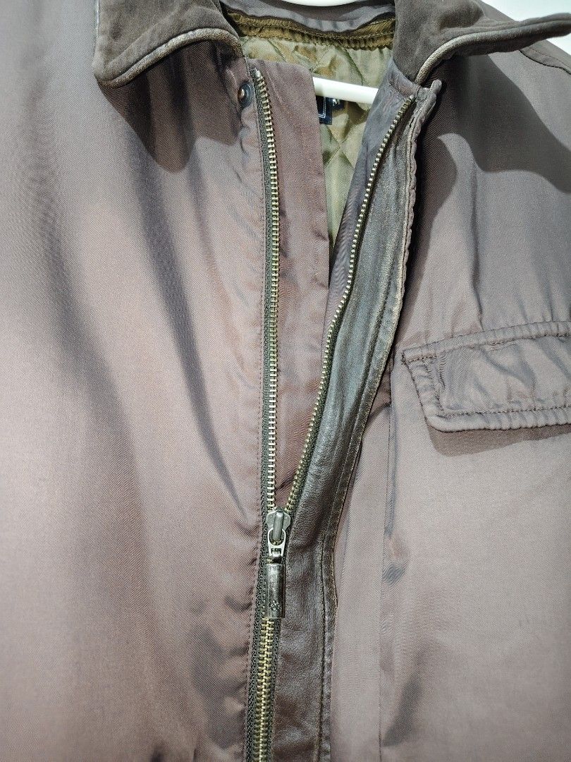 Kent & Curwen Utility Jacket (Category: Coats, Jackets and Outerwear) located in Lipa City. Submitted by gerardcala51660 (Listing ID 1470439667, Image 3). Description: Kent & Curwen Utility Jacket (with Detachable Inner) Medium on tag Dimensions: 24 inches x 31 inches Excellent condition (thrifted) – Needs wash – Color may vary slightly due to lighting Normal sign of usage at walang major flaws, Kent & Curwen utility jacket in brown. Features a d