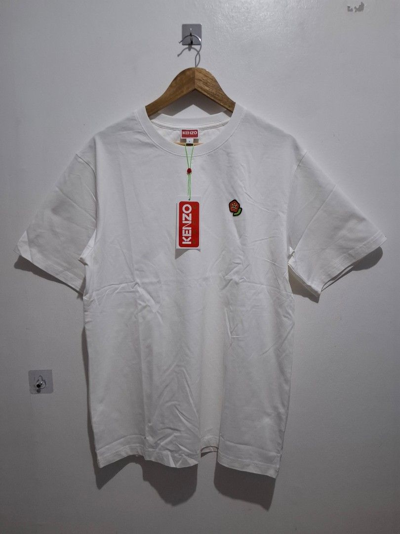 Kenzo size large (Category: Tshirts & Polo Shirts ) located in Tarlac. Submitted by christopher.24 (Listing ID 1470400795, Image 1). Description: brandnew.