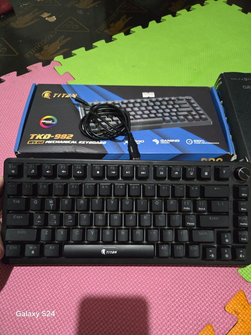 Keyboard and mouse (Category: Computer Keyboard) located in Manila. Submitted by supremo_dos (Listing ID 1470478466, Image 2). Description: - Complete gaming bundle: Titan TKD-982 mechanical keyboard & Delta Force gaming mouse - Both items include original retail boxes - Keyboard features vibrant RGB backlighting and a multi-function rotary knob - Mouse equipped with stylish edge RGB lighting and a durable braided cable - Tested and 100% working 