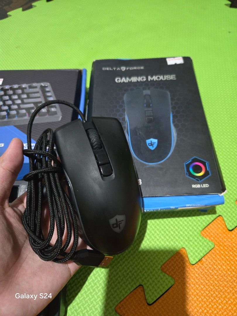 Keyboard and mouse (Category: Computer Keyboard) located in Manila. Submitted by supremo_dos (Listing ID 1470478466, Image 3). Description: - Complete gaming bundle: Titan TKD-982 mechanical keyboard & Delta Force gaming mouse - Both items include original retail boxes - Keyboard features vibrant RGB backlighting and a multi-function rotary knob - Mouse equipped with stylish edge RGB lighting and a durable braided cable - Tested and 100% working 