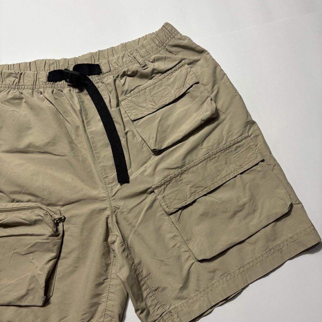Khaki Cargo Shorts with Built-In Webbing Belt (Category: Shorts) located in San Fernando. Submitted by lumang_gamit (Listing ID 1470398218, Image 2). Description: - Color: Khaki - Style: Utility shorts with multiple cargo pockets on both sides - Waistband: Elastic with an adjustable black webbing belt and quick-release buckle - Material: Lightweight fabric for all-day comfort - Best for: Outdoor activities, hiking, or casual daily wear - Storage: