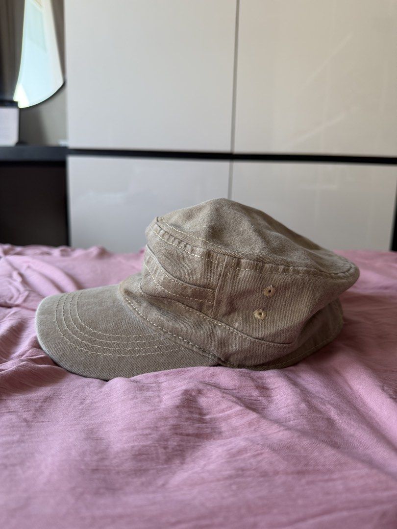 khaki washed cap (Category: Hats & Beanies) located in Manila. Submitted by _____car0usell (Listing ID 1470390793, Image 3). Description: - used only once - adjustable strap with a metal buckle at the back - with minor sweatband stain from wearing once, can easily be washed .