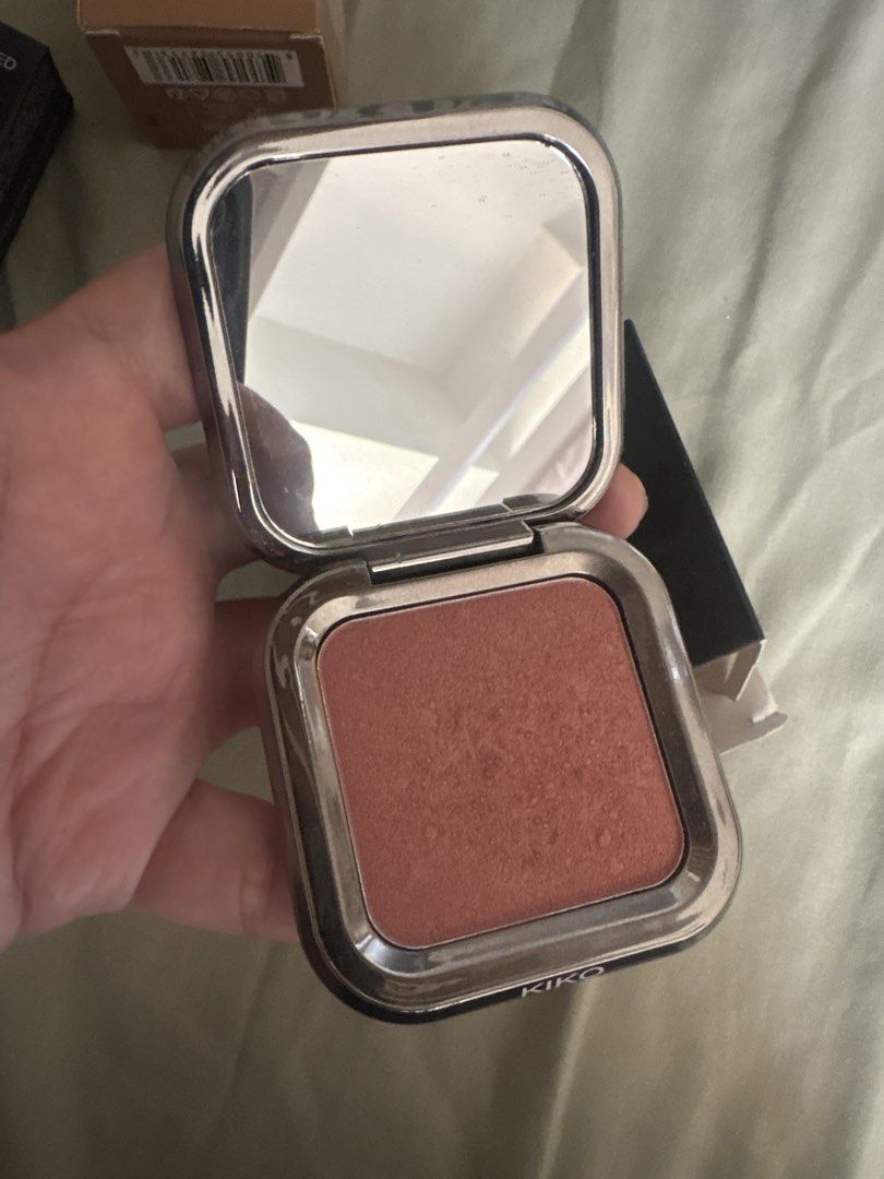 Kiko Milano Unlimited Blush (Category: Makeup) located in Manila. Submitted by mndoxajc (Listing ID 1470386367, Image 2). Description: - Brand: Kiko Milano Unlimited Blush - Shade: Warm terracotta peach - Size: Net weight 6 grams - Packaging: Sleek square compact with an inside mirror, complete with original black outer box - Condition: Authentic, brand new, box flap opens on the side - Perfect for everyday glowing makeup looks!.