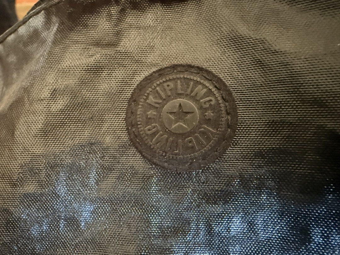 Kipling Piano Piano Keys Multi-Compartment Pouch Creativity Large (Category: Purses & Pouches) located in Quezon City. Submitted by clemg6 (Listing ID 1470421028, Image 2). Description: - Authentic Kipling piano keyboard print pouch - Sturdy zipper closure with embossed circular logo pull - Multiple inner zippered compartments for cards, coins, and small essentials - Dark textured finish on the back side - Versatile size, perfect for daily use or