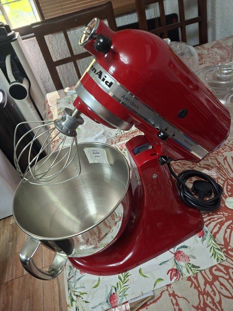 KitchenAid Artisan Stand Mixer Red Made In USA (Category: Hand & Stand Mixers) located in Taguig. Submitted by gongolly2007 (Listing ID 1470498657, Image 1). Description: - Authentic KitchenAid Artisan Stand Mixer in Classic Red (Made in USA) - Heavy-duty performance for all your baking and mixing needs display - Convenient tilt-head design for easy bowl access - Includes stainless steel bowl with a comfortable handle - Attachments included: Wire