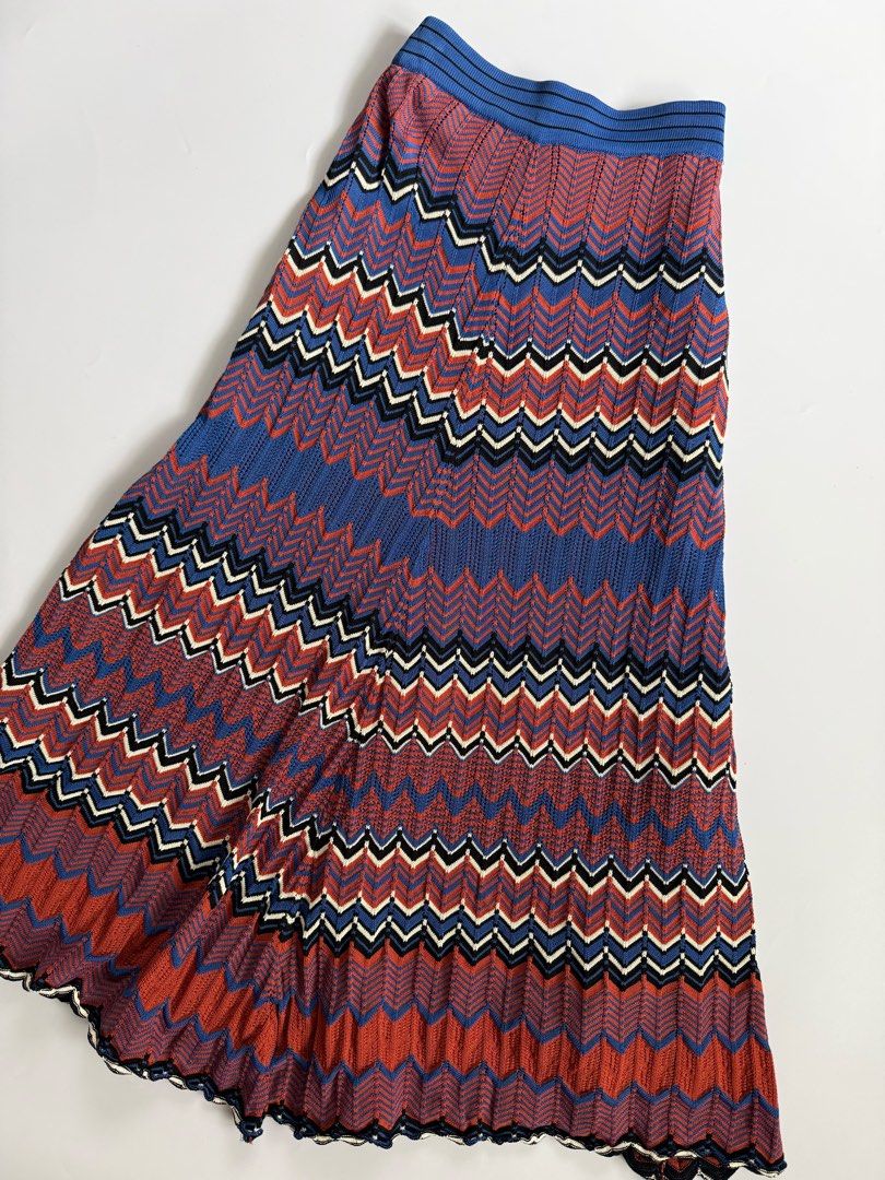 Knit midi skirt with chevron zig-zag pattern blue red (Category: Skirts) located in Tarlac. Submitted by kr_closet (Listing ID 1470481790, Image 2). Description: - Style: Knit midi skirt with a flared A-line silhouette - Pattern: Eye-catching blue, red, white, and black chevron zig-zag - Comfort: Elasticated ribbed blue waistband with great stretch - Details: Unique scalloped hem - Material: Heavy, high-quality ribbed knit.