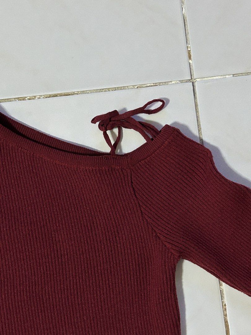 Knitted Maroon Asymmetrical Top (Category: Longsleeves) located in Manila. Submitted by viyyu (Listing ID 1470415449, Image 2). Description: •shoulder cutout with self-tie string detail on one shoulder •Slim fit with round neckline •Stretchy ribbed knit with good stretch •thick fabric.