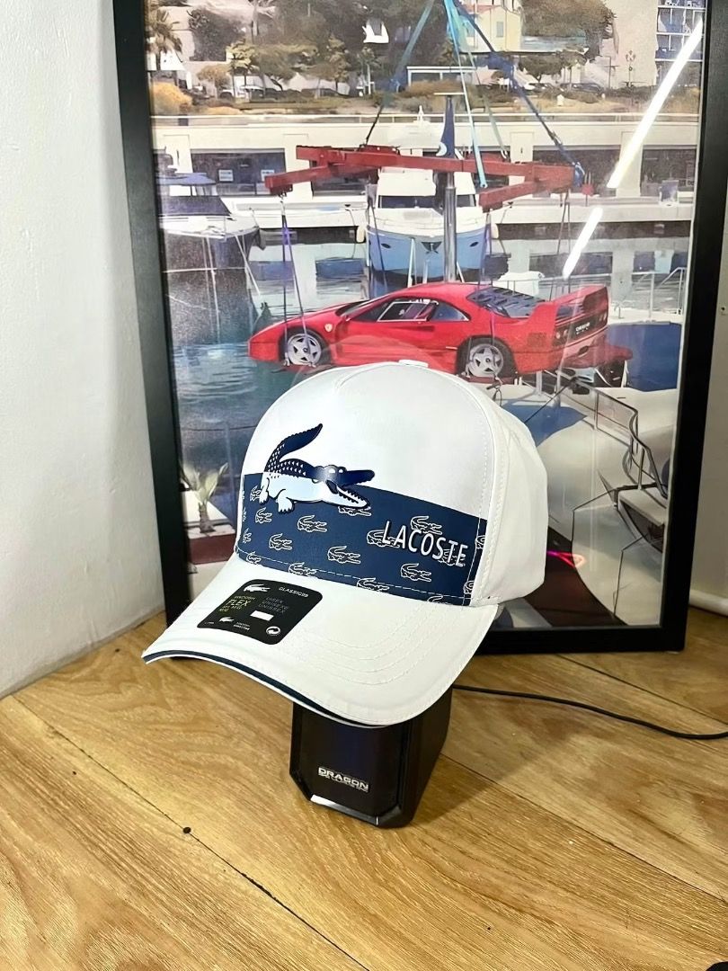 Lacoste 2 tone cap (Category: Caps & Hats) located in Caloocan City. Submitted by caarlthrifts (Listing ID 1470410518, Image 2). Description: Lacoste 2 tone cap.