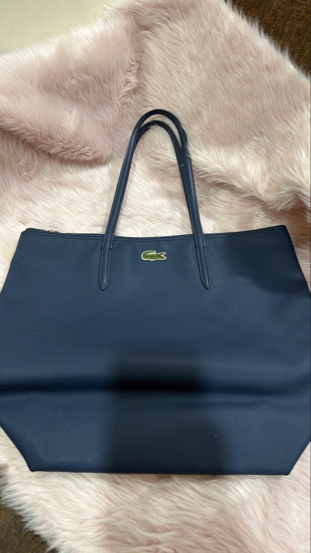Lacoste Bag (Category: Luxury Bags & Wallets) located in Manila. Submitted by coffeepanda1234 (Listing ID 1470456039, Image 1). Description: This is original. You can DM me for more pictures. .