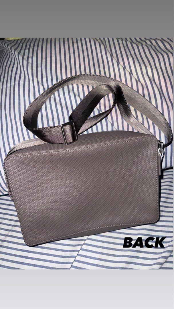 Lacoste Bnew (reporter bag/sling bag) (Category: Sling Bags) located in Manila. Submitted by glenn.vu12 (Listing ID 1470376011, Image 2). Description: Bnew lacoste sling bag w/ tag.