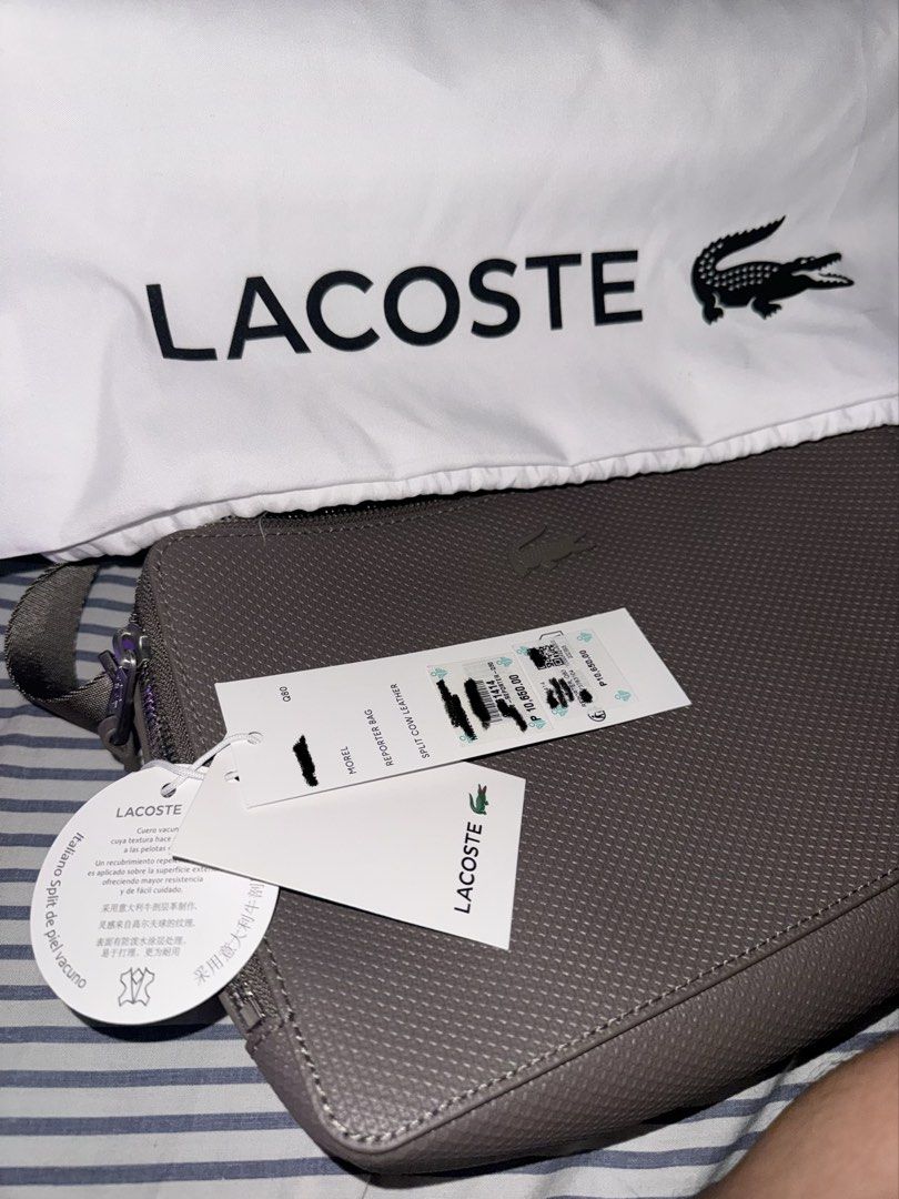 Lacoste Bnew (reporter bag/sling bag) (Category: Sling Bags) located in Manila. Submitted by glenn.vu12 (Listing ID 1470376011, Image 1). Description: Bnew lacoste sling bag w/ tag.