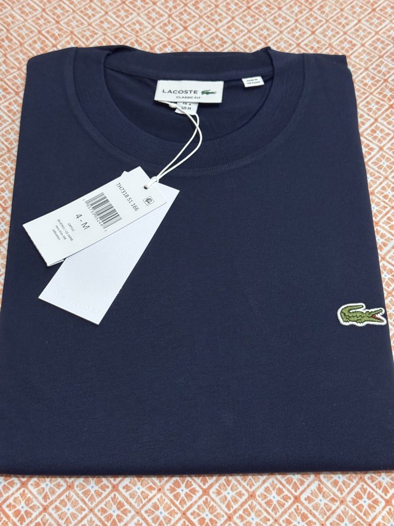Lacoste classic fit men shirt (Category: Announcements) located in Quezon City. Submitted by branded_jo (Listing ID 1470455271, Image 1). Description: Original Lacoste Men Shirts Classic fit Color navy blue Size 4/med Brand new with tag Bought in US Lalamove Ready.