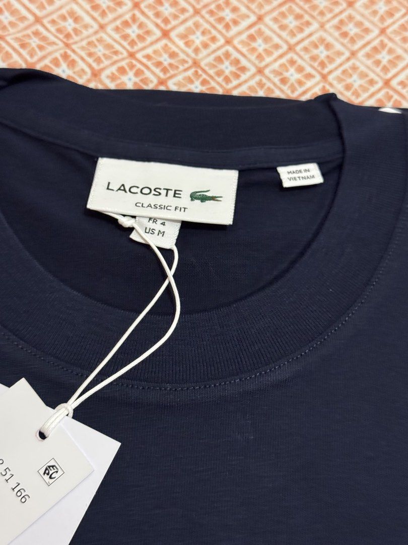 Lacoste classic fit men shirt (Category: Announcements) located in Quezon City. Submitted by branded_jo (Listing ID 1470455271, Image 2). Description: Original Lacoste Men Shirts Classic fit Color navy blue Size 4/med Brand new with tag Bought in US Lalamove Ready.
