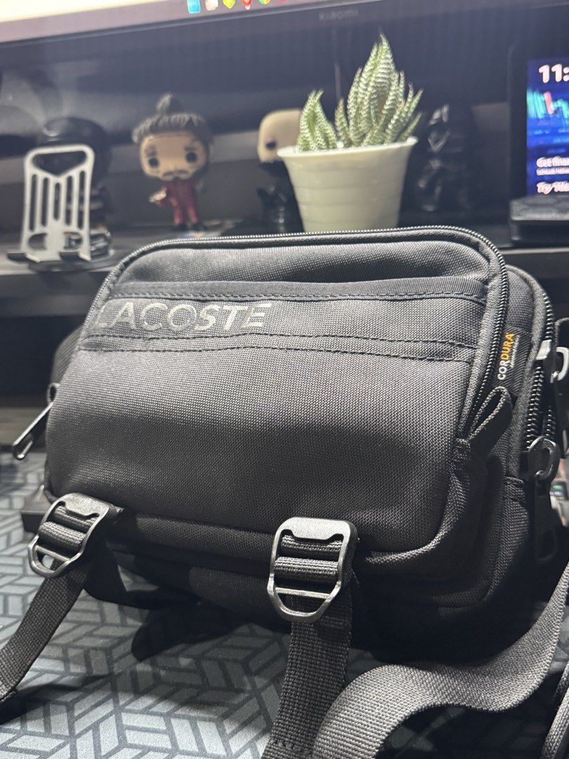 Lacoste Crossbody Bag (Category: Sling Bags) located in Quezon City. Submitted by justinpangnbn (Listing ID 1470359511, Image 1). Description: FOR SALE Lacoste Cross body bag Cordura (durable) Used for a few times only. Bought from Lacoste Japan (¥22k or Php8995) No issues. Stored on a storage box. Well maintained. Php 3,999 only. RFS: decluttering Quezon City meetups.