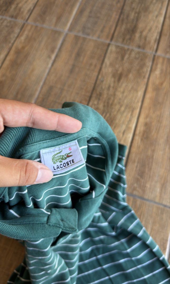 LACOSTE GREEN STRIPE (Category: Tshirts & Polo Shirts ) located in Manila. Submitted by urban-vintage_2 (Listing ID 1470392665, Image 3). Description: ISSUE: NONE (NEED WASH) MOP :GCASH (NO COD) SHIP VIA: LALAMOVE & J&T LOCATION: PASIG CITY LENGTH: 28 WIDTH : 24 .
