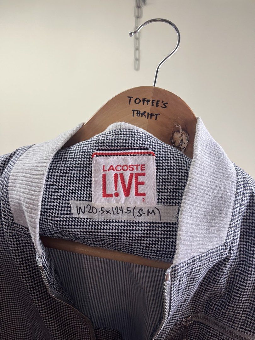 Lacoste Live Houndstooth Bomber Jacket Size 2 S/M (Category: Coats, Jackets and Outerwear) located in Malaybalay. Submitted by toffee_s_thrift0.1 (Listing ID 1470519476, Image 3). Description: - Brand: Lacoste Live - Style: Houndstooth bomber jacket - Color: Grey with striped interior lining - Details: Grey ribbed collar/cuffs/hem, full zip closure, zipped chest and side pockets, embroidered crocodile logo - Size: Tagged Size 2 (fits Small to Med