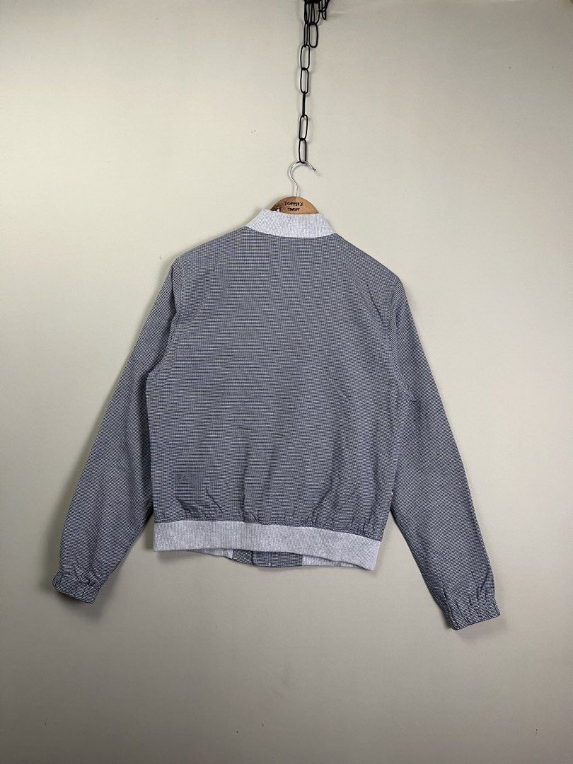 Lacoste Live Houndstooth Bomber Jacket Size 2 S/M (Category: Coats, Jackets and Outerwear) located in Malaybalay. Submitted by toffee_s_thrift0.1 (Listing ID 1470519476, Image 2). Description: - Brand: Lacoste Live - Style: Houndstooth bomber jacket - Color: Grey with striped interior lining - Details: Grey ribbed collar/cuffs/hem, full zip closure, zipped chest and side pockets, embroidered crocodile logo - Size: Tagged Size 2 (fits Small to Med