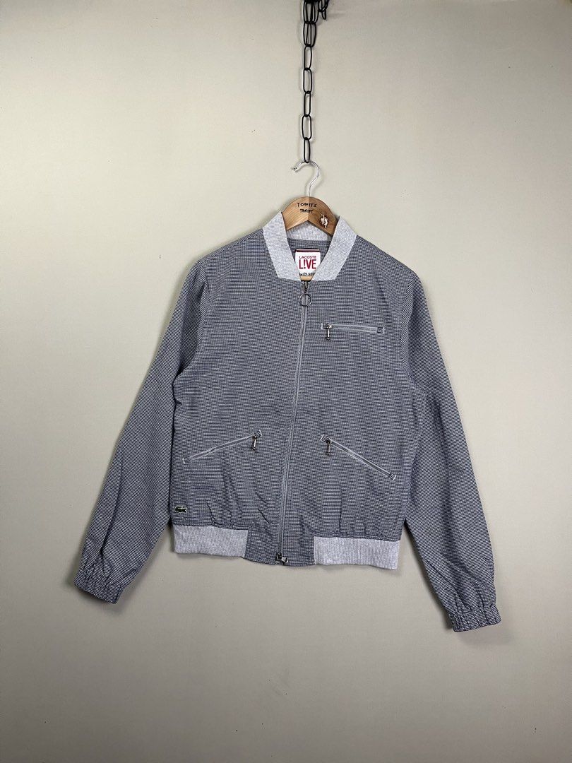 Lacoste Live Houndstooth Bomber Jacket Size 2 S/M (Category: Coats, Jackets and Outerwear) located in Malaybalay. Submitted by toffee_s_thrift0.1 (Listing ID 1470519476, Image 1). Description: - Brand: Lacoste Live - Style: Houndstooth bomber jacket - Color: Grey with striped interior lining - Details: Grey ribbed collar/cuffs/hem, full zip closure, zipped chest and side pockets, embroidered crocodile logo - Size: Tagged Size 2 (fits Small to Med