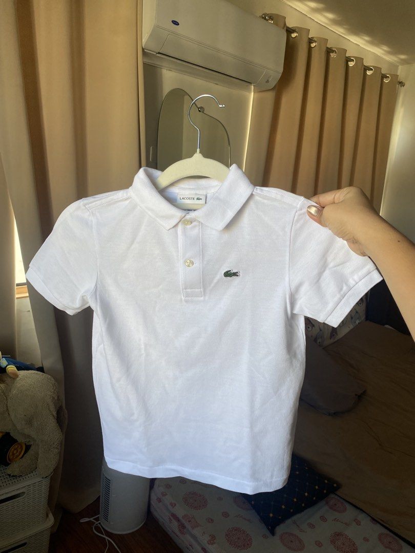 Lacoste polo for kids white 8A (Category: Babies & Kids Fashion) located in Cavite. Submitted by lz.closet (Listing ID 1470501186, Image 1). Description: Lacoste polo shirt for kids 8A white Likenew condition Fit 5-6 years old Authentic - preloved.