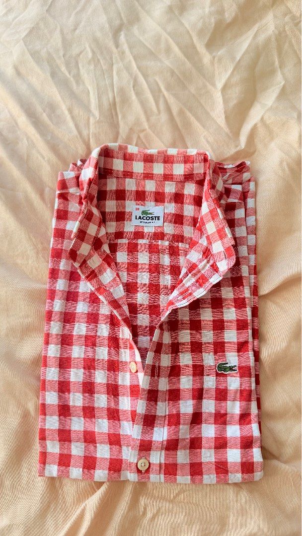 Lacoste short sleeved regular fit - Red plaid (S) (Category: Formal Shirts) located in Santa Rosa. Submitted by stealbydiva (Listing ID 1470392907, Image 2). Description: • Size: 38 Men (on tag) ✨ Condition: No major flaws, with minor stains on underarm area. Please refer to last two (2) photos. ⚠️ No returns or exchanges. Please check the size and measurements carefully before purchasing. 🔥 Interested? Send me a DM to claim this piece before it