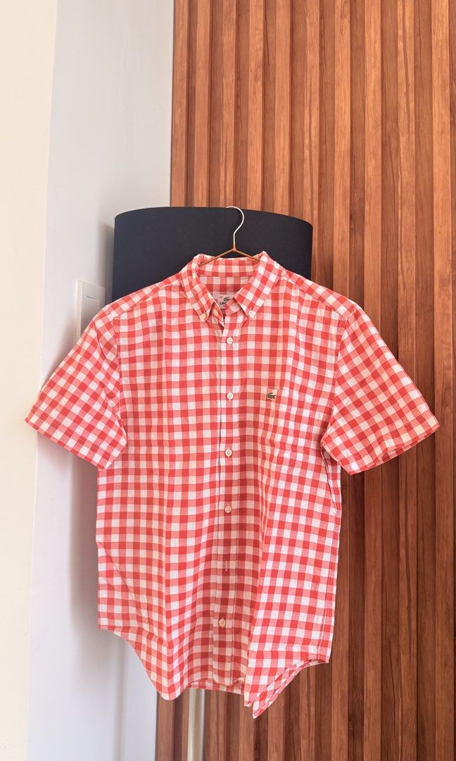 Lacoste short sleeved regular fit - Red plaid (S) (Category: Formal Shirts) located in Santa Rosa. Submitted by stealbydiva (Listing ID 1470392907, Image 1). Description: • Size: 38 Men (on tag) ✨ Condition: No major flaws, with minor stains on underarm area. Please refer to last two (2) photos. ⚠️ No returns or exchanges. Please check the size and measurements carefully before purchasing. 🔥 Interested? Send me a DM to claim this piece before it