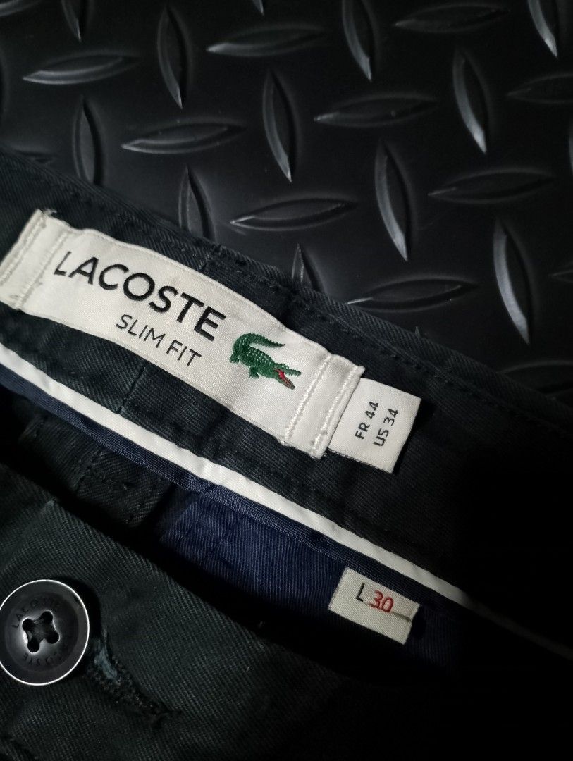 Lacoste Slim Fit Pants (Category: Activewear) located in Baguio. Submitted by bado.feels (Listing ID 1470479170, Image 2). Description: Issue: Last picture Size 34 Length 38 Thigh 12 Leg Opening 7 450+sf.