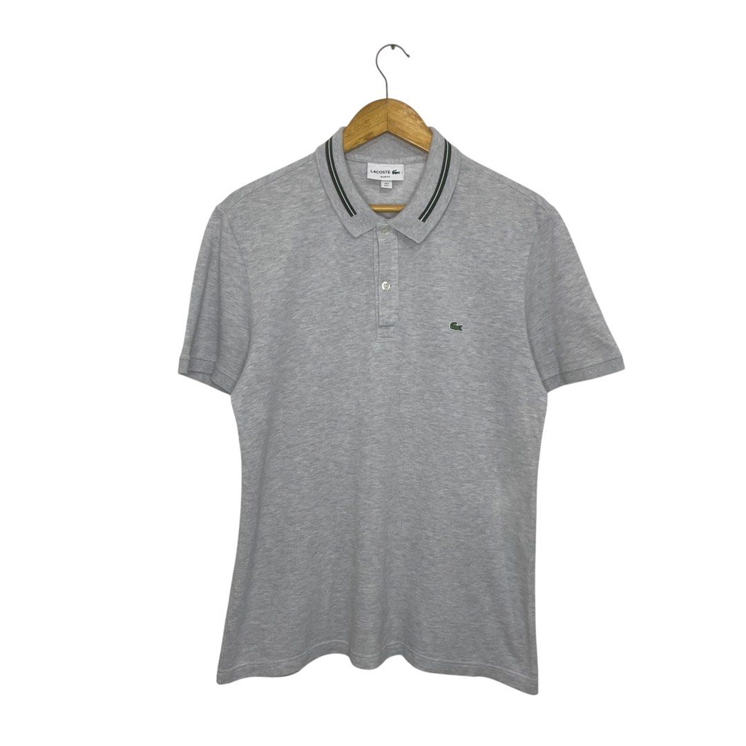 Lacoste Slim Fit Polo Shirt (Category: Luxury Apparel) located in Marikina City. Submitted by aalibabyy (Listing ID 1470522976, Image 1). Description: Lacoste Slim Fit Polo Shirt Size: Large Length: 27" Width: 21" No Issue Excellent Condition ₱1,500.