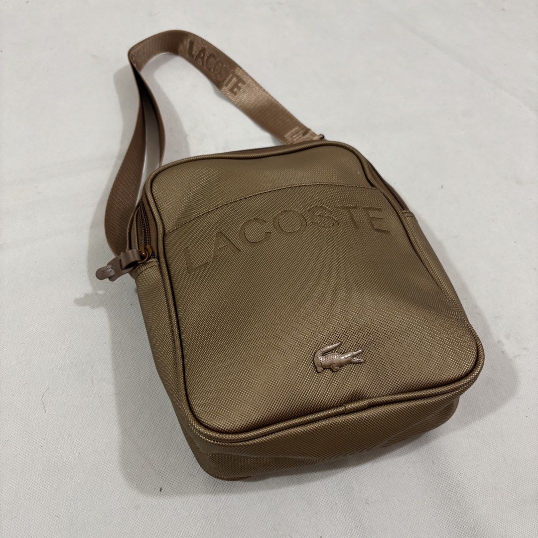 Lacoste Sling Shoulder Bag (Category: Shoulder Bags) located in Cavite. Submitted by itsayaaa (Listing ID 1470541838, Image 3). Description: No issue Excellent Condition .