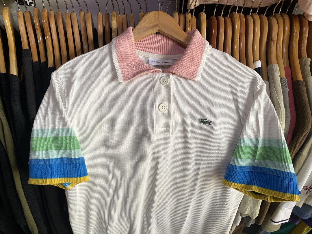 Lacoste Waffle Dress Polo (Category: Dresses) located in Kalibo. Submitted by rvna23 (Listing ID 1470376284, Image 2). Description: Lacoste white waffle-knit polo shirt featuring a pink ribbed collar and multi-colored striped cuffs dimes 34 x 19 no issue .