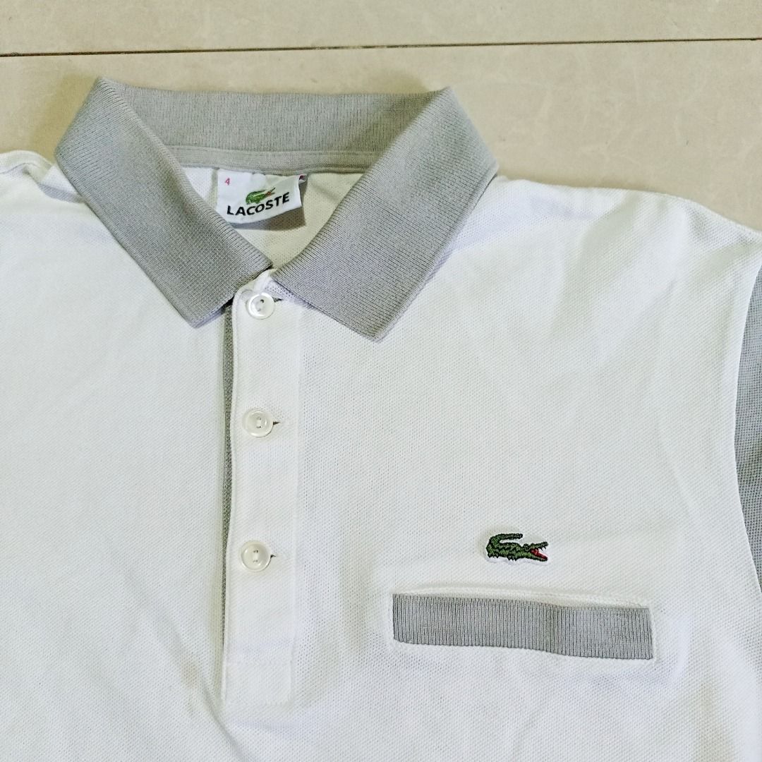 Lacoste White Grey Polo Shirt Size 4 (Category: Tshirts & Polo Shirts ) located in General Santos City (Dadiangas). Submitted by collection_9500 (Listing ID 1470543061, Image 3). Description: Lacoste White Grey Polo Shirt Size 4 19.5 x 24.5 Medium Excellent except washable stain Gensan loc Pm for inquiries All are thrifted items.