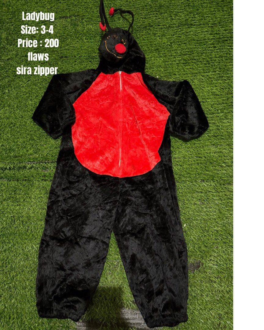 Ladybug Costume Size 3-4 (Category: Babies & Kids Fashion) located in San Fernando. Submitted by InvisibleMe (Listing ID 1470451367, Image 1). Description: - Size: 3-4 years old - Design: Black full-body fuzzy costume with red front circle and hood with cute antennae and red nose - Material: Soft and comfortable fuzzy fabric - Condition: Note that the zipper is broken (sira zipper) - Perfect for: Dress-up play, costume parties, and Halloween.