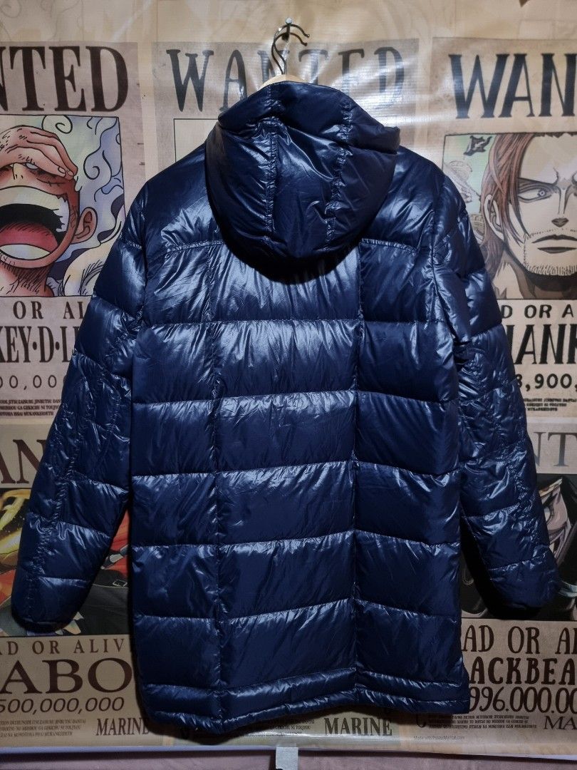 Lafuma Down Puffer Jacket With Hood (Category: Coats, Jackets and Outerwear) located in Imus. Submitted by aim_for_less (Listing ID 1470369759, Image 2). Description: Lafuma Down Puffer Jacket With Hood - Brand: Lafuma - SIZE: MEDIUM - DIMES: 23" x 32" - Color: Navy blue - Material: Warm down puffer with quilted pattern - Hood: Built-in hood for extra protection - Pockets: 1 zippered chest pocket and 2 lower snap-flap pockets - Details: Logo-stam